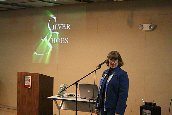 Melany Wilks, librarian at the Pioneer Memorial Library in Colby, Kansas, assists me with the set up for my first presentation of the day.