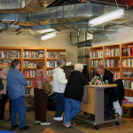 Signing books and meeting the patrons at the Pioneer Memorial Library in Colby, Kansas.