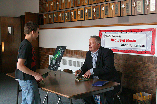 A discussion with Dakota Tate, one of the Decatur Junior/Senior High School students who bought a book after the assembly in Oberlin, Kansas.