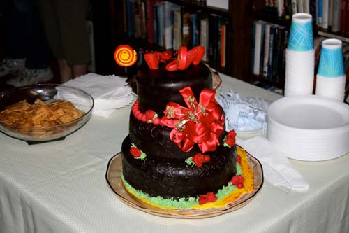 A lovely Oz-themed cake with ruby slippers on the top. I received a HUGE apology from the cake provider, Robyn Rhodes-Knutson, that they weren’t silver!