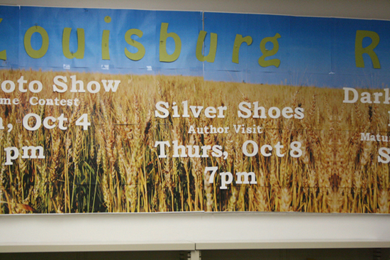 A colorful banner, running the length of one wall, announced my event for “Silver Shoes.”