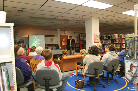 Paul Miles Schneider talks about his new book “Silver Shoes” at the Louisburg Public Library. October 8, 2009.