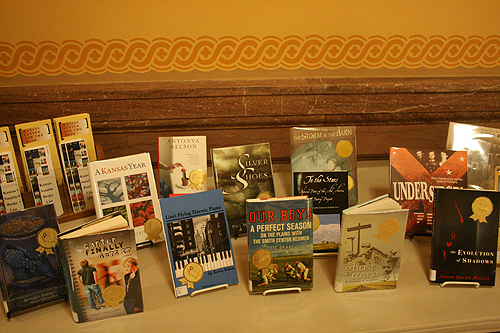 A display of the fifteen 2010 Kansas Notable Books just outside the entrance to the old Supreme Court chambers at the State Capitol in Topeka.