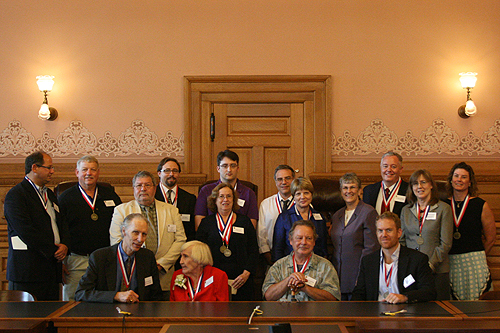 The celebrated authors of the 2010 Kansas Notable Books, along with Roy Bird (Director of the Kansas Center for the Book) and Jo Budler (State Librarian of Kansas). They’re the two without the medals hanging around their necks.