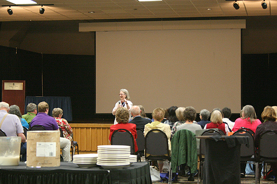 Guest speaker Nancy Pickard in front of the crowd at the KLA annual convention.