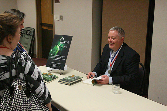 Paul Miles Schneider chats with librarians at the Kansas Library Association's 2011 Annual Convention.