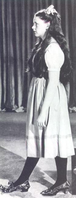 Judy Garland testing the Arabian Shoes on her front foot for “The Wizard of Oz.”