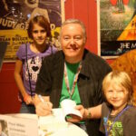 I think signing books for smiling, eager kids may be my favorite part of any festival. The young and the young of heart are why I do what I do. OZtoberFest 2014, Wamego, Kansas.
