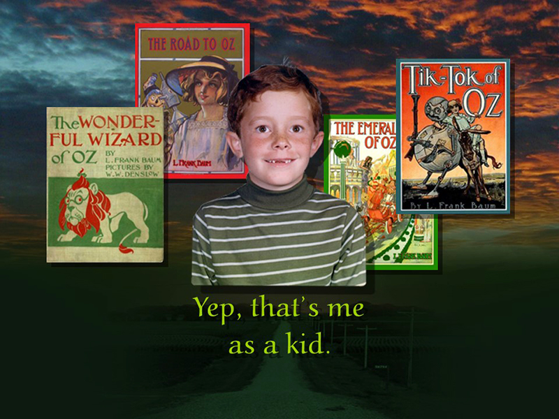 PowerPoint slide of a young Paul Miles Schneider, surrounded by vintage Oz books.