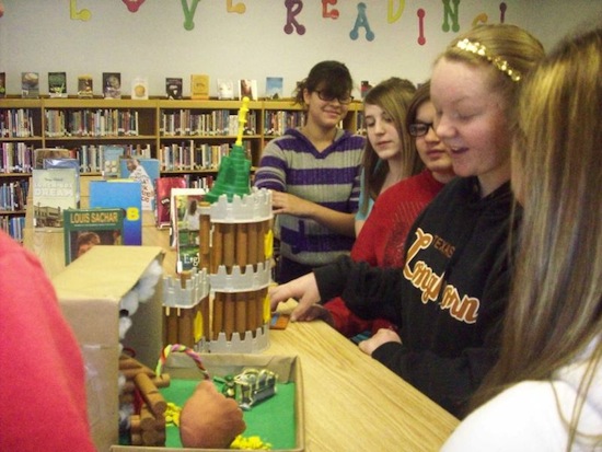 Students from Oswego Middle School in Oswego, Kansas, working on dioramas that depict scenes from the novel "Silver Shoes."