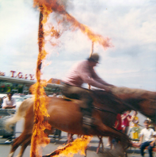 Parking lot pyrotechnics performed by Dick Ryan and his horse, British Wonder.